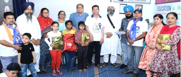 Talented children were honored on Babasaheb's birthday at Ambedkar Nagar Dhadde